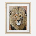 Courage by A. Poe — framed canvas print of a male lion with an intense golden gaze and full mane